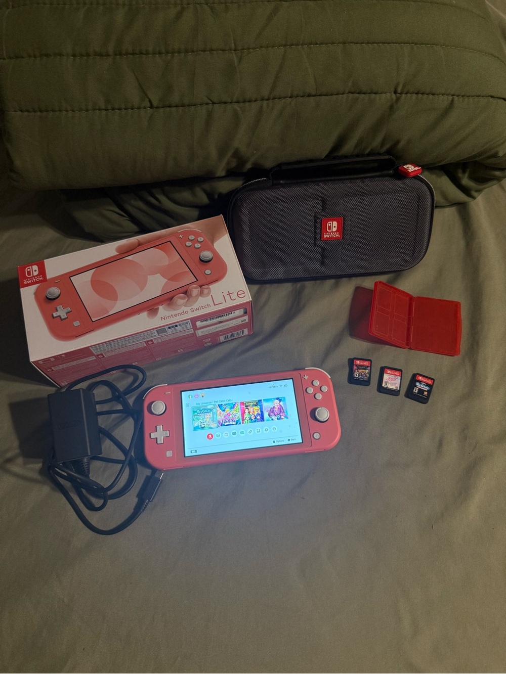 Nintendo Switch Lite Pink Handheld Console with Case and Games
